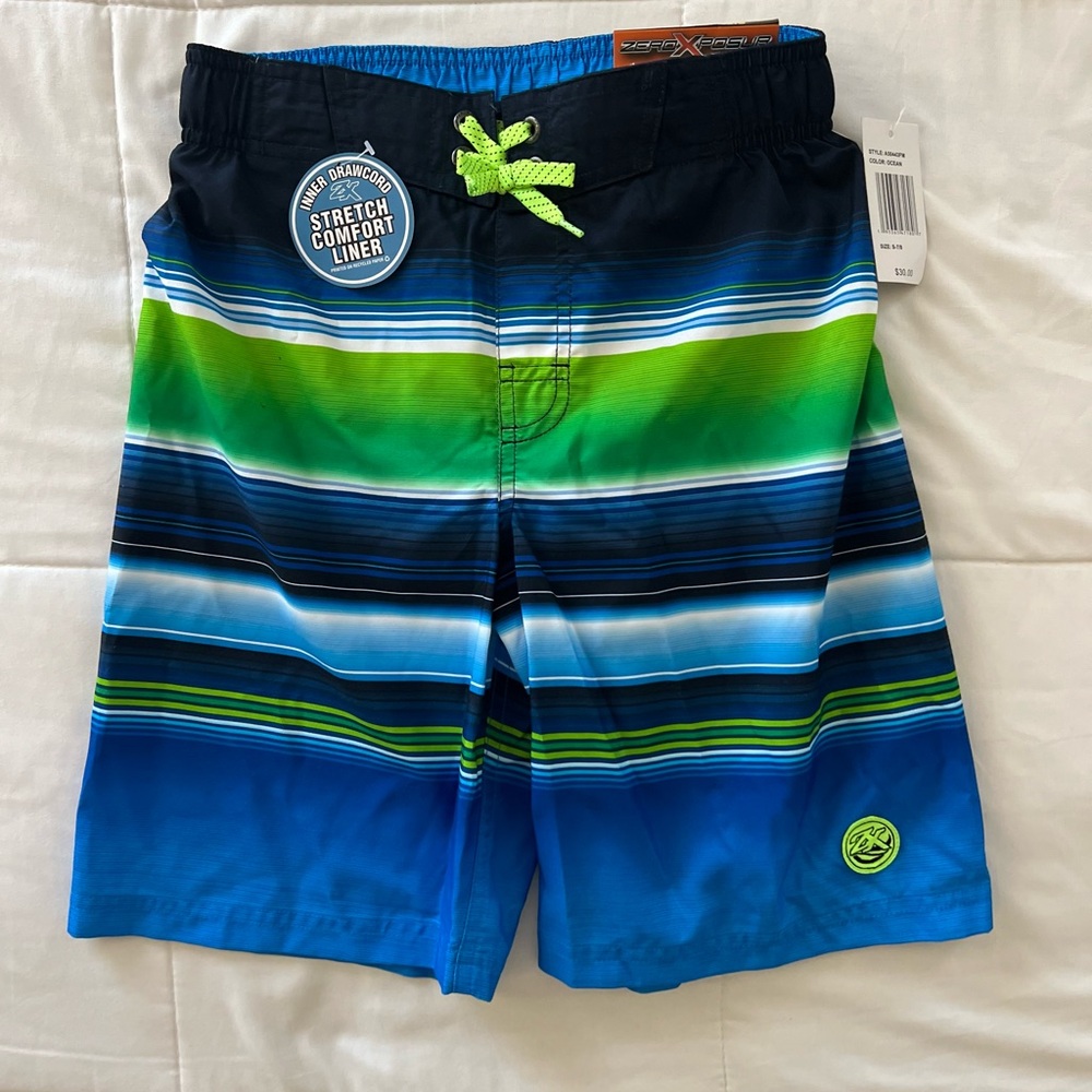 ZeroXPosur swim trunks. Boys Size 7/8. New with tags.